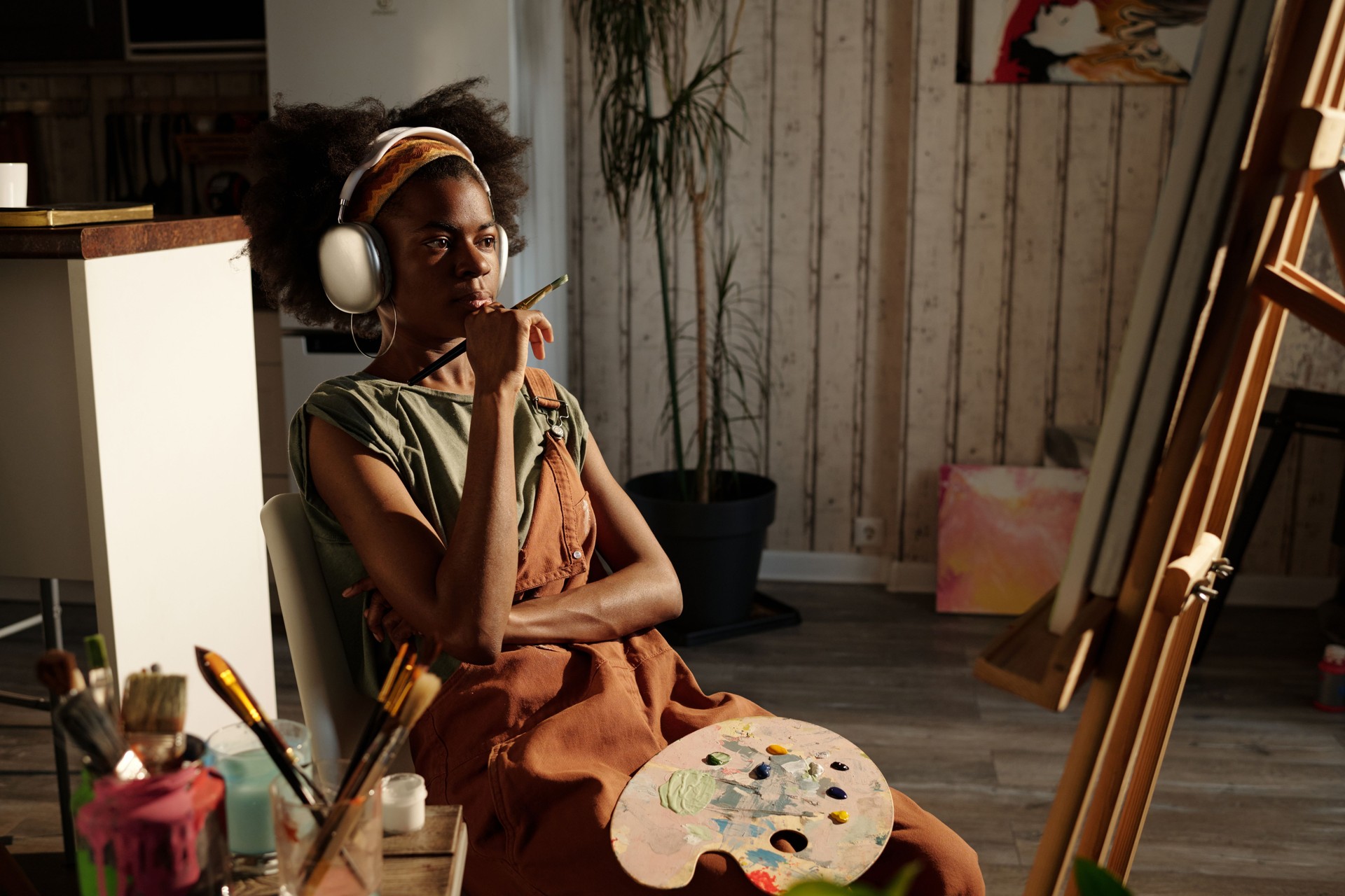 Reflecting Artist Listening Music While Painting